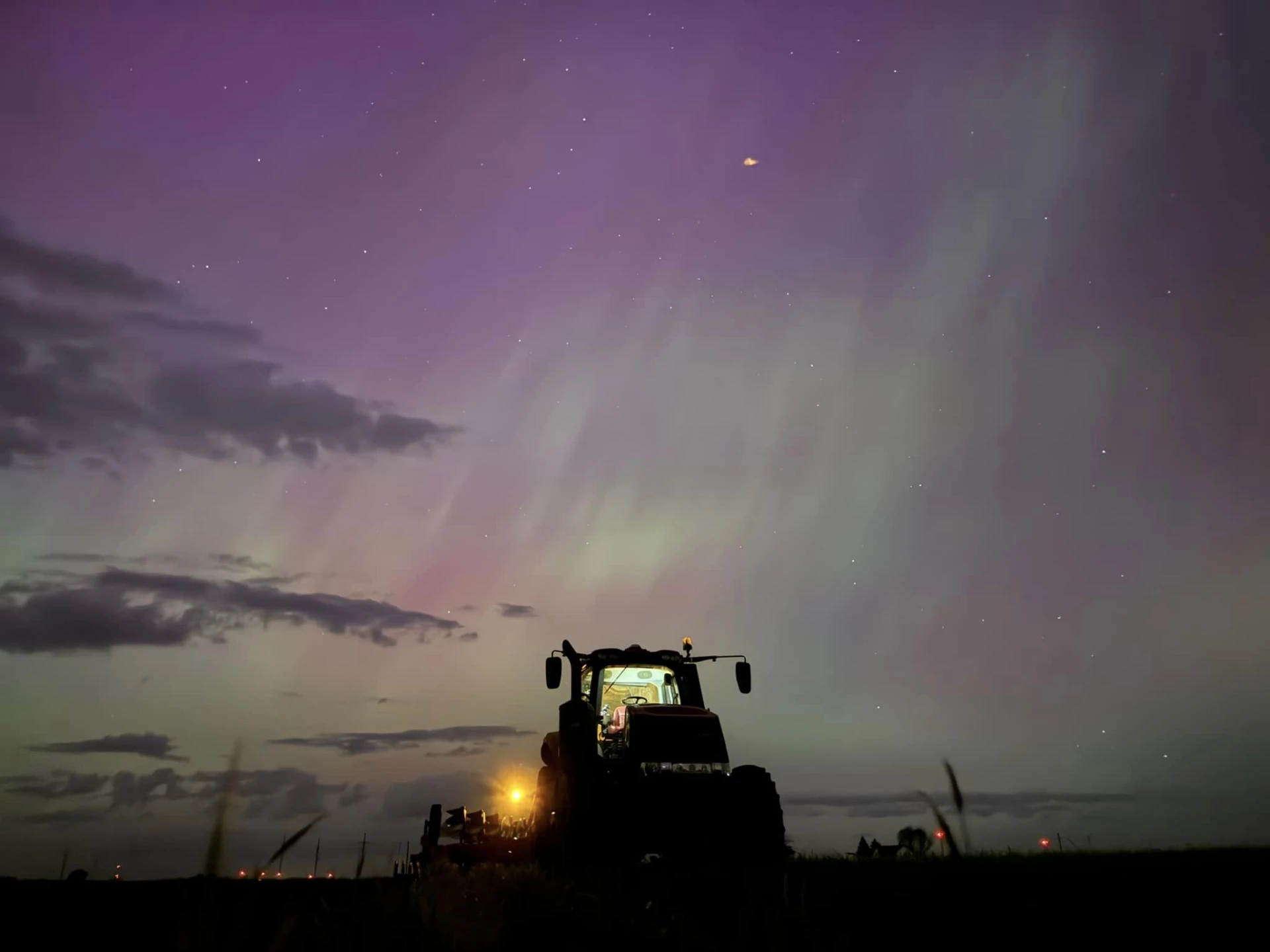 Plowing under the northern lights tonight