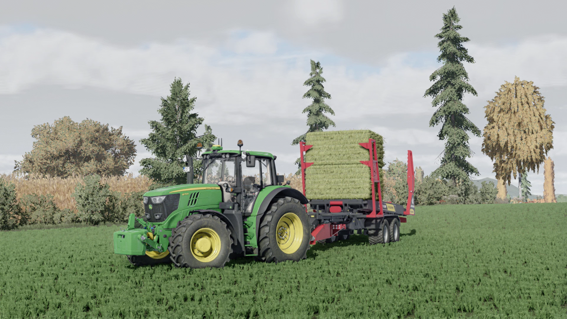 Tractor Hauling a Load of Hay Bales